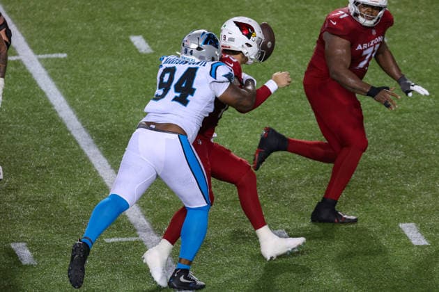CANTON, OH - AUGUST 06: Carolina Panthers defensive end Jared Harrison-Hunte (94) sacks Arizona Cardinals quarterback Carson Beck (19) during the second quarter of the National Football League preseason game between the Carolina Panthers and Arizona Cardinals on August 6, 2026, at the Tom Benson Hall of Fame Stadium in Canton, OH. (Photo by Frank Jansky Icon Sportswire) NFL, American Football Herren, USA AUG 06 Hall of Fame Game - Panthers vs Cardinals EDITORIAL USE ONLY Icon26080612