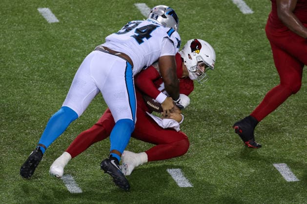 CANTON, OH - AUGUST 06: Carolina Panthers defensive end Jared Harrison-Hunte (94) sacks Arizona Cardinals quarterback Carson Beck (19) during the second quarter of the National Football League preseason game between the Carolina Panthers and Arizona Cardinals on August 6, 2026, at the Tom Benson Hall of Fame Stadium in Canton, OH. (Photo by Frank Jansky Icon Sportswire) NFL, American Football Herren, USA AUG 06 Hall of Fame Game - Panthers vs Cardinals EDITORIAL USE ONLY Icon26080613