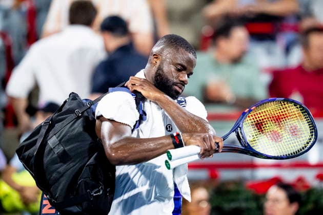 August 6, 2026, Montreal, Pq, Canada: Frances Tiafoe of the United States exits the court after withdrawing during his match with Arthur Rinderknech of France on day five of the National Bank Open tennis tournament in Montreal on Thursday, August 6, 2026. Canada News - August 6, 2026  - ZUMAc35_ 20260806_zaf_c35_122 Copyright: xChristopherxKatsarovx