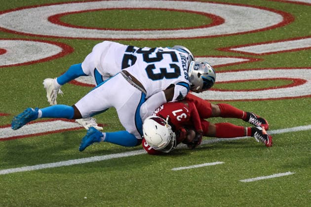 CANTON, OH - AUGUST 06: Arizona Cardinals running back Corey Kiner (37) is tackled short of the goal line by Carolina Panthers linebacker Claudin Cherelus (53) and Carolina Panthers safety Lathan Ransom (22) during the first quarter of the National Football League preseason game between the Carolina Panthers and Arizona Cardinals on August 6, 2026, at the Tom Benson Hall of Fame Stadium in Canton, OH. (Photo by Frank Jansky Icon Sportswire) NFL, American Football Herren, USA AUG 06 Hall of Fame Game - Panthers vs Cardinals EDITORIAL USE ONLY Icon26080644