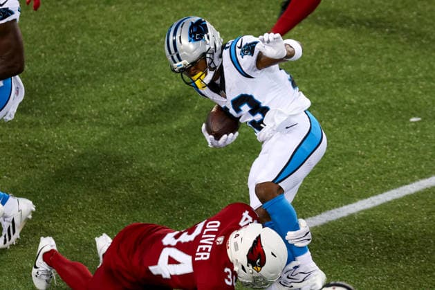 CANTON, OH - AUGUST 06: Carolina Panthers wide receiver John Metchie III (13) is tackled by Arizona Cardinals safety Isaiah Oliver (34) after making a catch during the second quarter of the National Football League preseason game between the Carolina Panthers and Arizona Cardinals on August 6, 2026, at the Tom Benson Hall of Fame Stadium in Canton, OH. (Photo by Frank Jansky Icon Sportswire) NFL, American Football Herren, USA AUG 06 Hall of Fame Game - Panthers vs Cardinals EDITORIAL USE ONLY Icon26080652