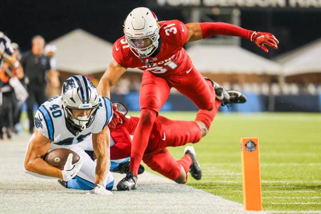 August 6, 2026, Canton, Ohio, USA: Arizona Cardinals running back EMARI DEMERCADO (31) attempts to break up at pass from Carolina Panthers linebacker KRYS BARNES (40) at the 2026 Pro Football Hall of Fame Game between the Carolina Panthers and Arizona Cardinals at Tom Benson Hall of Fame Stadium on August 6, 2026 in Canton, Ohio. NFL, American Football Herren, USA 2026: Hall Of Fame Game - Carolina Panthers Vs. Arizona Cardinals - NFL Preseason 2026  - ZUMAs335 20260806_znp_s335_001 Copyright: xMatthewxSmithx