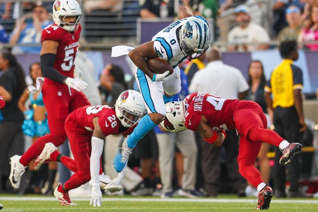 August 6, 2026, Canton, Ohio, USA: Carolina Panthers player attempts to hurdle over Arizona Cardinals at the 2026 Pro Football Hall of Fame Game between the Carolina Panthers and Arizona Cardinals at Tom Benson Hall of Fame Stadium on August 6, 2026 in Canton, Ohio. Canton USA - ZUMAs335 20260806_znp_s335_017 Copyright: xMatthewxSmithx
