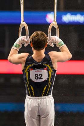 Gymnastics: Gymnastics: Xfinity US Gymnastics Championships Bo McCrea of Lakeshore Gym competes on still rings exercise in the junior division of the Xfinity USA Gymnastics Championship at the Mortgage Matchup Center in Phoenix, Arizona, Thursday, August 6, 2026. (Thomas Fernandez Image of . Phoenix Arizona United States EDITORIAL USE ONLY Copyright: xx ThomasxFernandezx iosphotos417383
