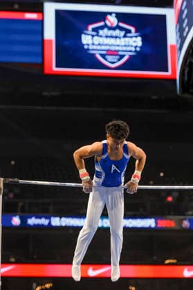 Gymnastics: Gymnastics: Xfinity US Gymnastics Championships JJ Pacquing of Alpha WA competes on horizontal bar exercise in the junior division of the Xfinity USA Gymnastics Championship at the Mortgage Matchup Center in Phoenix, Arizona, Thursday, August 6, 2026. (Thomas Fernandez Image of . Phoenix Arizona United States EDITORIAL USE ONLY Copyright: xx ThomasxFernandezx iosphotos417338
