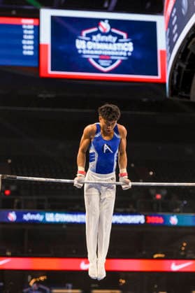 Gymnastics: Gymnastics: Xfinity US Gymnastics Championships JJ Pacquing of Alpha WA competes on horizontal bar exercise in the junior division of the Xfinity USA Gymnastics Championship at the Mortgage Matchup Center in Phoenix, Arizona, Thursday, August 6, 2026. (Thomas Fernandez Image of . Phoenix Arizona United States EDITORIAL USE ONLY Copyright: xx ThomasxFernandezx iosphotos417369