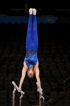 Gymnastics: Gymnastics: Xfinity US Gymnastics Championships Abe Stewart of Momentum competes on parrellel bars exercise in the junior division of the Xfinity USA Gymnastics Championship at the Mortgage Matchup Center in Phoenix, Arizona, Thursday, August 6, 2026. (Thomas Fernandez Image of . Phoenix Arizona United States EDITORIAL USE ONLY Copyright: xx ThomasxFernandezx iosphotos417393
