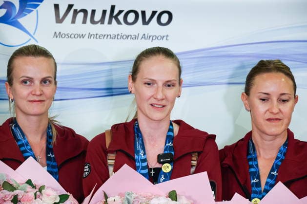 RUSSIA, MOSCOW - AUGUST 7, 2026: Russian national synchronised swimming team head coach Svetlana Romashina (C) and coaches Marina Golyadkina (L) and Daria Alexandrova pose during the Russian national synchronised swimming team™s arrival at Vnukovo Airport. The team returned from France after the 2026 European Aquatics Championships, held in Paris from July 31 to August 16, having won three gold, one silver, and three bronze medals. Russian athletes performed in the event under a neutral status Russian Synchronised Swimming Team Arrive Home After 2026 European Aquatics Championships  - ZUMAt113 20260807_zaa_t113_003 Copyright: xVladimirxGerdox