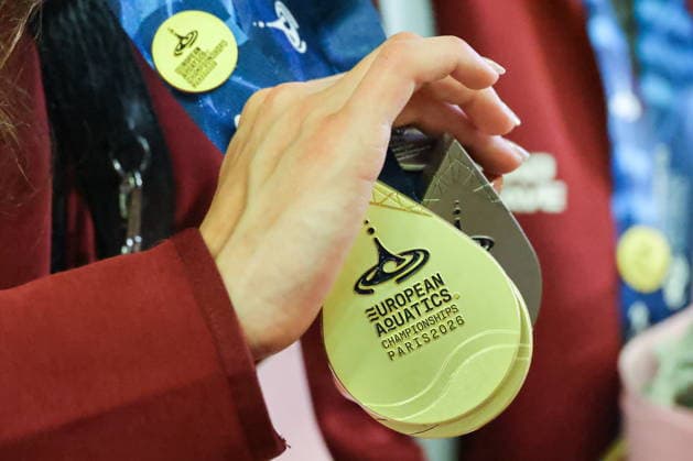 RUSSIA, MOSCOW - AUGUST 7, 2026: Gold medals are pictured during the Russian national synchronised swimming team’s arrival at Vnukovo Airport. The team returned from France after the 2026 European Aquatics Championships, held in Paris from July 31 to August 16, having won three gold, one silver, and three bronze medals. Russian athletes performed in the event under a neutral status. Vladimir Gerdo TASS  95869736
