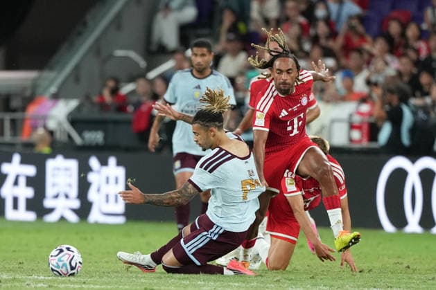 Audi Football Summit 2026: FC Bayern Munich VS Aston Villa Sacha Boey of FC Bayern Munich and Luka Lynch of Aston Villa. during a match of FC Bayern Munich VS Aston Villa at Kai Tan Stadium during the Audi Football Summit 2026 on August 7, 2026 in Hong Kong. (Photo by Ellan Mad Nexpher Images) Hong Kong