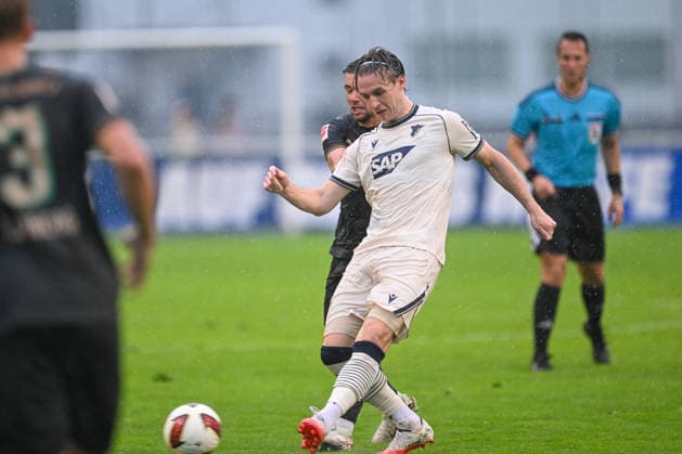 SOCCER - Hoffenheim vs Gladbach, test match SCHWAZ,AUSTRIA,07.AUG.26 - SOCCER - 1. DFL, 1. Deutsche Bundesliga, TSG Hoffenheim vs Borussia Mönchengladbach, test match. Image shows Patrick Wimmer (Hoffenheim) and Kevin Stoeger (Gladbach).  GEPAxpictures xDanielxSchoenherr