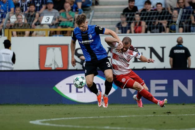 07.08.2026, xhettx, Fussball 3.Liga, SV Waldhof Mannheim - Fortuna Düsseldorf v.l. Moritz Polte (SV Waldhof Mannheim, 3) im Zweikampf mit Holtmann, Eric (Fortuna Düsseldorf, 9) (DFL DFB REGULATIONS PROHIBIT ANY USE OF PHOTOGRAPHS as IMAGE SEQUENCES and or QUASI-VIDEO) *** August 7, 2026, xhettx, Soccer 3rd Division, SV Waldhof Mannheim vs. Fortuna Düsseldorf, left: Moritz Polte (SV Waldhof Mannheim), No. 3 in a tackle with Holtmann, Eric (Fortuna Düsseldorf), No. 9. DFL and DFB regulations prohibit any use of photographs as image sequences and or quasi-video.