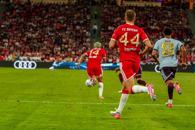 HONG KONG-SPORTS BAYERN-ASTON-VILLA Players of Bayern Munich celebrate after scoring a goal against Aston Villa during their exhibition football match at the Kai Tak Stadium on August 7, 2026 in Hong Kong. Bayern Munich secured a 2-1 victory over Aston Villa in the pre-season friendly. (Photo by Zulu Lo TMHK via Nexpher Images) Hong Kong