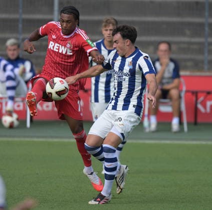 07.08.2026, xophax, Fussball 1.Bundesliga, 1.FC Koeln Testspiel im Franz - Kremer - Stadion in Köln . 1.FC Köln gegen Real Sociedad San Sebastian. Reigan Heskey , links ( 1.FC Köln ) und Luken Beitia , rechts ( San Sebastian ) Kitzbühel *** August 7, 2026, xophax, Soccer, Bundesliga 1, 1. FC Köln Friendly Match at Franz Kremer Stadium in Cologne: 1. FC Köln vs. Real Sociedad San Sebastián. Reigan Heskey (left, 1. FC Köln) and Luken Beitia (right, San Sebastián). Kitzbühel