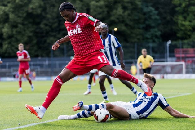 COLOGNE, GERMANY - AUGUST 07: Reigan Heskey (1. FC Koeln, 11) controls the ball against Luken Beitia (Real Sociedad San Sebastian, 37) during a friendly match of season 2026 27 between 1. FC Köln vs. Real Sociedad San Sebastian at Geissbockheim on August 07, 2026 in Cologne, Germany. North Rhine Westphalia Germany Copyright: xSteffiexWunderlx