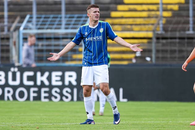 2026.08.07, xkwix, Fußball, Regionalliga West, FC Gütersloh - VfL Bochum II, Heidewaldstadion, 2.Spieltag, Saison 2026 2027: Aleksandar Kandic (FC Gütersloh 27) streckt die Arme aus DFB regulations prohibit any use of photographs as image sequences and or quasi-video. Photo: xKamilxWilkowskixPressefotoKochx Nordrhein-Westfalen Deutschland *** August 7, 2026, xkwix, Soccer, Regionalliga West, FC Gütersloh vs. VfL Bochum II, Heidewaldstadion, Matchday 2, 2026–2027 Season Aleksandar Kandic of FC Gütersloh 27 raises his arms DFB regulations prohibit any use of photographs as image sequences and or quasi-video Photo by xKamilxWilkowskixPressefotoKochx North Rhine-Westphalia, Germany