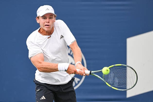 MONTREAL, QC - AUGUST 07: Alex Michelsen (USA) returns the ball during a third round match at National Bank Open on August 07, 2026 at IGA Stadium in Montreal, QC (Photo by David Kirouac Icon Sportswire) TENNIS: AUG 07 National Bank Open EDITORIAL USE ONLY Icon26080700826