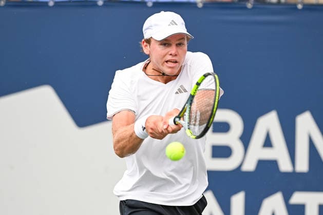 MONTREAL, QC - AUGUST 07: Alex Michelsen (USA) returns the ball during a third round match at National Bank Open on August 07, 2026 at IGA Stadium in Montreal, QC (Photo by David Kirouac Icon Sportswire) TENNIS: AUG 07 National Bank Open EDITORIAL USE ONLY Icon26080700926