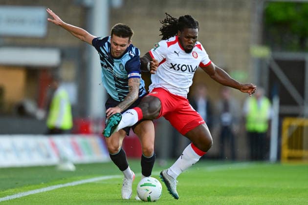 Wycombe Wanderers v Stevenage, EFL Cup Stevenage midfielder Dan Philipps (8) battles for possession with Wycombe Wanderers defender Daniel Harvie (3) during the EFL Cup match between Wycombe Wanderers and Stevenage at Adams Park, High Wycombe, UK on 7 August 2026. High Wycombe Adams Park Buckinghamshire UK Editorial use only DataCo restrictions apply See www.football-dataco.com , Copyright: xDennisxGoodwinx PSI-24673-0003