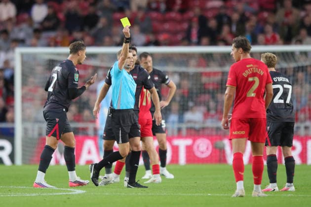 Middlesbrough v Wrexham FC, EFL Cup Lewis O™Brien of Wrexham receives a yellow card from Referee Will Finnie during the EFL Cup match between Middlesbrough and Wrexham FC at the Riverside Stadium, Middlesbrough, UK on 7 August 2026. Middlesbrough Riverside Stadium North Yorkshire UK Editorial use only DataCo restrictions apply See www.football-dataco.com , Copyright: xAlunxRobertsx PSI-24667-0012