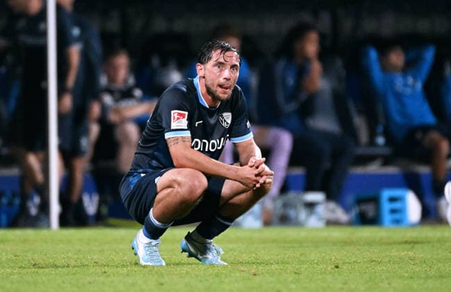 Bochum, Germany, 2. Bundesliga, Matchday 1, Vonovia Ruhrstadion Bochum, VfL Bochum vs Hertha BSC Berlin 0:1; Maximilian Wittek (BOC) disappointed after the match. Disappointment, Frustration, Action. *** Bochum, Germany, 2. Bundesliga, Matchday 1, Vonovia Ruhrstadion Bochum, VfL Bochum vs. Hertha BSC Berlin 0–1 Maximilian Wittek BOC disappointed after the match Disappointment, Frustration, Action