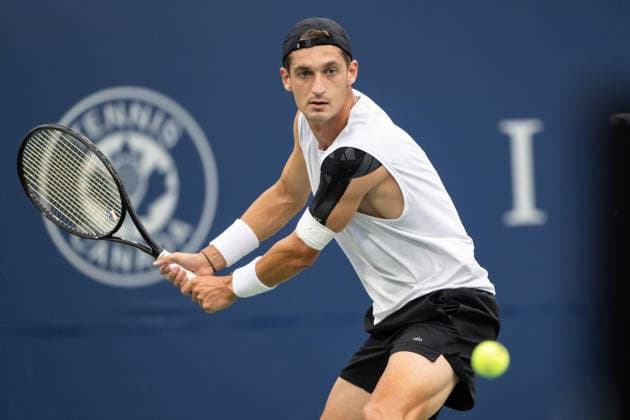 MONTREAL, QC - AUGUST 07: Terence Atmane from France returns the ball against Jakub. Mensik from Czechia during their singles third round match on day six of the ATP, Tennis Herren 1000 National Bank Open presented by Rogers at Stade IGA on August 7, 2026 in Montreal, Quebec, Canada.(Photo by Vincent Ethier Icon Sportswire) TENNIS: AUG 07 National Bank Open EDITORIAL USE ONLY Icon2608070503