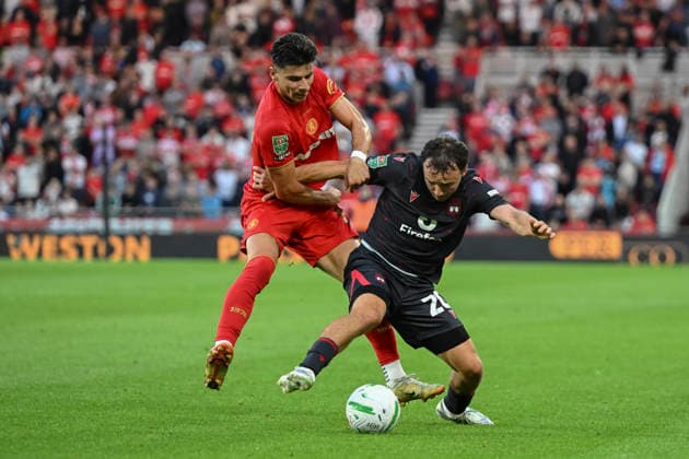 Middlesbrough v Wrexham - Carabao Cup First Round Max Arfsten of Middlesbrough challenges Oliver Rathbone of Wrexham AFC during the Carabao Cup 1st Round match between Middlesbrough and Wrexham at the Riverside Stadium in Middlesbrough, United Kingdom, on August 7, 2026. Middlesbrough North Yorkshire United Kingdom  Copyright: xMIxNewsx originalFilename:fletcher-middlesb260807_npyGu.jpg