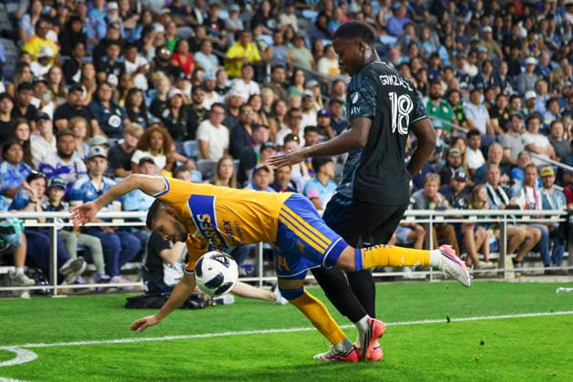August 7, 2026, St. Paul, Minnesota, United States: Tigres UANL midfielder JESUS GARZA (14) takes a fall in front of Minnesota United FC forward MAURICIO GONZALEZ (18). Minnesota United hosted Tigres UANL August 7th. The teams faced off at Allianz Field in St. Paul, Minnesota. Tigres UANL was victorious in a penalty shootout. Leagues Cup 2026 - Tigres UANL 4:2 Minnesota United  - ZUMAt166 20260807_zsp_t166_046 Copyright: xMichaelxTurnerx