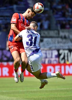 Kopfballduell Zweikampf Aktion Patrick Kammerbauer VfL Osnabrueck (31) gegen Marcel Costly 1. FC Heidenheim 1846 FCH (24) 1. FC Heidenheim 1846 FCH vs VfL Osnabrueck 08.08.2026 DFL REGULATIONS PROHIBIT ANY USE OF PHOTOGRAPHS AS IMAGE SEQUENCES AND OR QUASI-VIDEO 1. FC Heidenheim 1846 FCH vs VfL Osnabrueck *** Heading duel, tackle, action: Patrick Kammerbauer (VfL Osnabrück 31) vs. Marcel Costly (1. FC Heidenheim 1846 FCH 24), 1. FC Heidenheim 1846 FCH vs. VfL Osnabrück, August 8, 2026 DFL regulations prohibit any use of photographs as image sequences and or quasi-video. 1 FC Heidenheim 1846 FCH vs. VfL Osnabrück