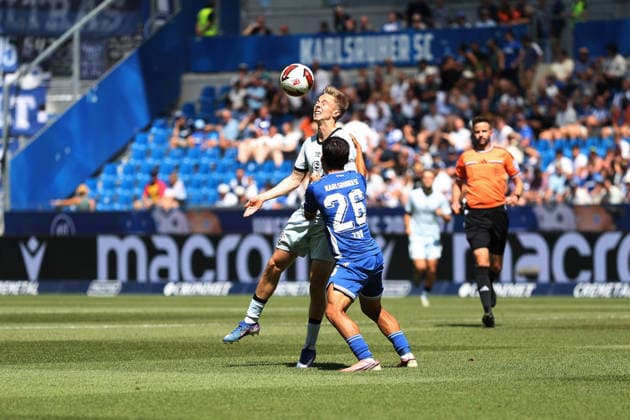 Sam Schreck (Arminia Bielefeld, 8),Sebastian Jung (SC Karlsruhe , 2) GER, SC Karlsruhe - DSC Arminia Bielefeld Fussball 1.Spieltag Spielzeit 2026 2027 2.Bundesliga 08.08.2026 (DFL DFB REGULATIONS PROHIBIT ANY USE OF PHOTOGRAPHS as IMAGE SEQUENCES and or QUASI-VIDEO). GER SC Karlsruhe - DSC Arminia Bielefeld Fussball 1.Spieltag Spielzeit 2026 2027 08.08.2026 *** Sam Schreck, Arminia Bielefeld, 8; Sebastian Jung, SC Karlsruhe, 2 GER, SC Karlsruhe vs. DSC Arminia Bielefeld Soccer Matchday 1, 2026–2027 Season, 2. Bundesliga, August 8, 2026. DFL and DFB regulations prohibit any use of photographs as image sequences and or quasi-VVIDEO GER SC Karlsruhe DSC Arminia Bielefeld Soccer Matchday 1 Season 2026–2027 August 8, 2026 Copyright: xEibner-Pressefoto JoergxHirschx EP_JHH