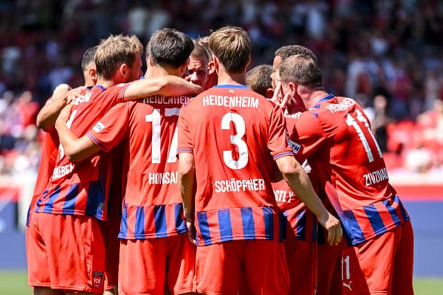 Jan Schoeppner (1. FC Heidenheim 1846) Torjubel, jubelt mit seiner Mannschaft nach treffer zum 3:2 waehrend des spiels der 2. Bundesliga zwischen 1. FC Heidenheim und VfL Osnabrueck, Voith-Arena am 08. August 2026 in Heidenheim an der Brenz, Deutschland. (Foto von Harry Langer DeFodi Images) +++ Jan Schoeppner (1. FC Heidenheim 1846) celebrates after scoring his team s third goal with teammates during the 2nd Bundesliga match between 1. FC Heidenheim and VfL Osnabrueck at Voith-Arena on August 8, 2026 in Heidenheim an der Brenz, Germany. (Photo by Harry Langer DeFodi Images) DFB DFL REGULATIONS PROHIBIT ANY USE OF PHOTOGRAPHS AS IMAGE SEQUENCES AND OR QUASI-VIDEO. (Photo by Harry Langer DeFodi Images) DFB DFL REGULATIONS PROHIBIT ANY USE OF PHOTOGRAPHS AS IMAGE SEQUENCES AND OR QUASI-VIDEO. - *** Jan Schoeppner of 1 FC Heidenheim 1846 celebrates a goal with his team after scoring to make it 3–2 during the 2. Bundesliga match between 1 FC Heidenheim and VfL Osnabrück, Voith Arena on August 8, 2026, in Heidenheim an der Brenz, Germany. Photo by Harry Langer, DeFodi Images. Jan Schoeppner of 1 FC Heidenheim 1846 celebrates with his teammates after scoring his team’s third goal during the 2nd Bundesliga match between 1 FC Heidenheim and VfL Osnabrück at Voith Arena on August 8, 2026 in Heidenheim an der Brenz, Germany. Photo by Harry Langer, DeFodi Images. DFB and DFL regulations prohibit any use of photographs as image sequences and or quasi-video. Photo by Harry Langer, DeFodi Images. DFB and DFL regulations prohibit any use of photographs as imSEQUENCES AND OR QUASI-VIDEO