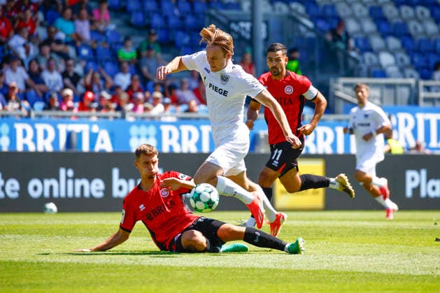 08.08.2026, xavx, Fussball 3.Liga, SV Wehen Wiesbaden - Preußen Münster v.l. Justin Janitzek (SV Wehen Wiesbaden), Ryan Johansson (Preußen Münster), Tarik Gözüsirin (SV Wehen Wiesbaden) (DFL DFB REGULATIONS PROHIBIT ANY USE OF PHOTOGRAPHS as IMAGE SEQUENCES and or QUASI-VIDEO) Wiesbaden *** August 8, 2026, xavx, Soccer 3rd Division, SV Wehen Wiesbaden vs. Preußen Münster: Justin Janitzek (SV Wehen Wiesbaden), Ryan Johansson (Preußen Münster), Tarik Gözüsirin (SV Wehen Wiesbaden). DFL and DFB regulations prohibit any use of photographs as image sequences and or quasi-video. Wiesbaden
