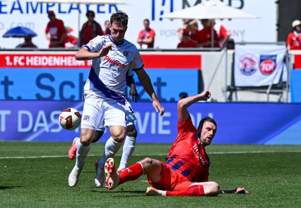 08.08.2026, xemx, Fussball 2.Bundesliga, 1.FC Heidenheim - VfL Osnabrück v.l. Robin Meissner (VfL Osnabrück), Patrick Mainka (1.FC Heidenheim) Zweikampf, Aktion, action, battle for the ball (DFL DFB REGULATIONS PROHIBIT ANY USE OF PHOTOGRAPHS as IMAGE SEQUENCES and or QUASI-VIDEO) Heidenheim *** August 8, 2026, xemx, Soccer, 2. Bundesliga, 1. FC Heidenheim vs. VfL Osnabrück, Robin Meissner (VfL Osnabrück), Patrick Mainka, 1 FC Heidenheim, tackle, action, battle for the ball. DFL and DFB regulations prohibit any use of photographs as image sequences and or quasi-video. Heidenheim