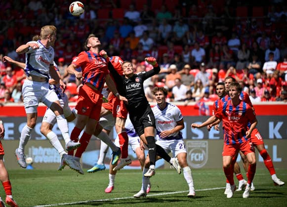 Strafraumszene, Torraumszene Torwart Frank Feller 1. FC Heidenheim 1846 FCH (01) Aktion 1. FC Heidenheim 1846 FCH vs VfL Osnabrueck 08.08.2026 DFL REGULATIONS PROHIBIT ANY USE OF PHOTOGRAPHS AS IMAGE SEQUENCES AND OR QUASI-VIDEO 1. FC Heidenheim 1846 FCH vs VfL Osnabrueck *** Penalty area scene, Goalmouth action: Goalkeeper Frank Feller, 1 FC Heidenheim 1846 (FCH) 01, 1 FC Heidenheim 1846 (FCH) vs. VfL Osnabrück, August 8, 2026. DFL regulations prohibit any use of photographs AS IMAGE SEQUENCES AND OR QUASI-VIDEO 1 FC Heidenheim 1846 FCH vs. VfL Osnabrück