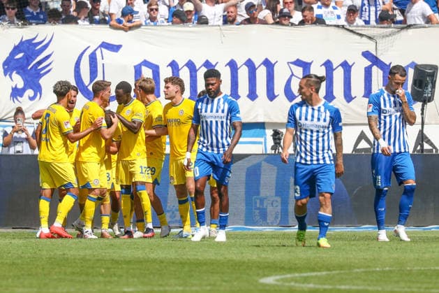08.08.2026, xgox, Fussball - 2.Bundesliga 1.FC Magdeburg - Eintracht Braunschweig emspor, v.l. Jubel nach dem 0:4 durch Mehmet Can Aydin (Braunschweig, 8), Magdeburg enttaeuscht, schaut enttaeuscht, niedergeschlagen, disappointed (DFL DFB REGULATIONS PROHIBIT ANY USE OF PHOTOGRAPHS as IMAGE SEQUENCES and or QUASI-VIDEO) Magdeburg *** August 8, 2026, xgox, Soccer 2. Bundesliga: 1. FC Magdeburg vs. Eintracht Braunschweig, emspor, from left: Celebrations after the 0–4 goal by Mehmet Can Aydin (Braunschweig), 8, Magdeburg disappointed, looking disappointed, dejected, disappointed DFL DFB REGULATIONS PROHIBIT ANY USE OF PHOTOGRAPHS as IMAGE SEQUENCES and or QUASI-VIDEO Magdeburg