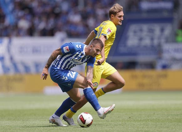 Mateusz Zukowski (1.FC Magdeburg), Lukas Frenkert (Eintracht Braunschweig) Fussball, Herren, Saison 2026 2027 2.BL, Avnet Arena, 1.Spieltag, 1.FC Magdeburg gegen Eintracht Braunschweig DFL REGULATIONS PROHIBIT ANY USE OF PHOTOGRAPHS AS IMAGE SEQUENCES AND OR QUASI-VIDEO. *** Mateusz Zukowski, 1. FC Magdeburg; Lukas Frenkert, Eintracht Braunschweig; Soccer, Men s, 2026–2027 Season, 2. Bundesliga, Avnet Arena, Matchday 1, 1 FC Magdeburg vs. Eintracht Braunschweig. DFL regulations prohibit any use of photographs as image sequences and or quasi-video.