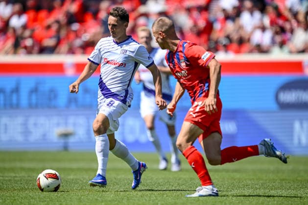 Konrad Faber (VfL Osnabrueck) und Adrian Beck (1. FC Heidenheim 1846) im Zweikampf waehrend des spiels der 2. Bundesliga zwischen 1. FC Heidenheim und VfL Osnabrueck, Voith-Arena am 08. August 2026 in Heidenheim an der Brenz, Deutschland. (Foto von Harry Langer DeFodi Images) +++ Konrad Faber (VfL Osnabrueck) und Adrian Beck (1. FC Heidenheim 1846) battle for the ball during the 2nd Bundesliga match between 1. FC Heidenheim and VfL Osnabrueck at Voith-Arena on August 8, 2026 in Heidenheim an der Brenz, Germany. (Photo by Harry Langer DeFodi Images) DFB DFL REGULATIONS PROHIBIT ANY USE OF PHOTOGRAPHS AS IMAGE SEQUENCES AND OR QUASI-VIDEO. (Photo by Harry Langer DeFodi Images) DFB DFL REGULATIONS PROHIBIT ANY USE OF PHOTOGRAPHS AS IMAGE SEQUENCES AND OR QUASI-VIDEO. - *** Konrad Faber of VfL Osnabrück and Adrian Beck of 1 FC Heidenheim 1846 go head-to-head during the 2. Bundesliga match between 1 FC Heidenheim and VfL Osnabrück, at the Voith Arena on August 8, 2026, in Heidenheim an der Brenz, Germany. Photo by Harry Langer, DeFodi Images. Konrad Faber of VfL Osnabrück and Adrian Beck of 1 FC Heidenheim 1846 battle for the ball during the 2. Bundesliga match between 1 FC Heidenheim and VfL Osnabrück at Voith Arena on August 8, 2026 in Heidenheim an der Brenz, Germany. Photo by Harry Langer, DeFodi Images. DFB and DFL regulations prohibit any use of photographs as image sequences and or quasi-video. Photo by Harry Langer, DeFodi Images. DFB and DFL regulations prohibit any use of photographs as imSEQUENCES AND OR QUASI-VIDEO