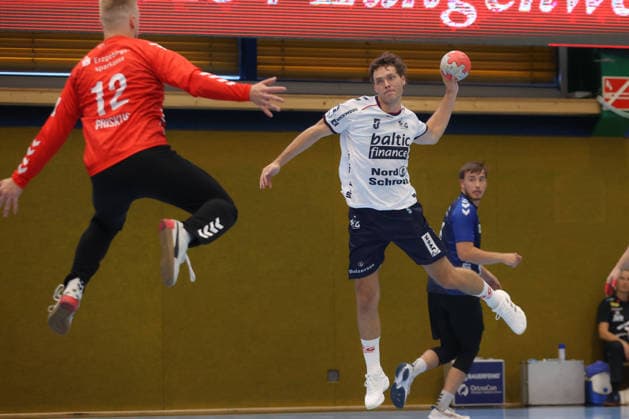 08.08.2026, xtgx, Handball Turnier, EHV Aue - SG Flensburg-Handewitt emspor, v.l. Niclas Kirkelokke (Kirkelökke, Flensburg, 5) wirft Tor, Torschuetze, erzielt Tor, Treffer, scores the goal Lößnitz *** August 8, 2026, xtgx, handball tournament, EHV Aue vs. SG Flensburg Handewitt emspor, from left: Niclas Kirkelokke Kirkelökke, Flensburg, 5 shots on goal, goal scorer, scores the goal, Lößnitz