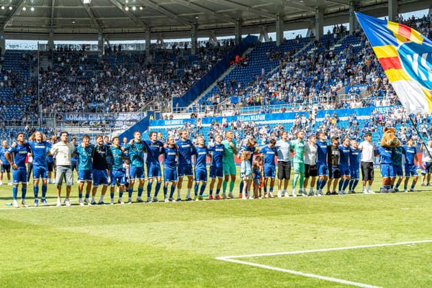 08.08.2026, xdaymx, Fussball 2.Bundesliga, Karlsruher SC - Arminia Bielefeld. Mannschaft aus Karlsruhe jubelt nach dem 2:1 Heimsieg gegen Bielefeld vor der Heimkurve. (DFL DFB REGULATIONS PROHIBIT ANY USE OF PHOTOGRAPHS as IMAGE SEQUENCES and or QUASI-VIDEO) Karlsruhe *** August 8, 2026, xdaymx, Soccer 2. Bundesliga, Karlsruher SC vs. Arminia Bielefeld: The Karlsruhe team celebrates in front of their home stands after a 2–1 home win against Bielefeld. DFL and DFB regulations prohibit any use of photographs as image sequences and or quasi-video. Karlsruhe