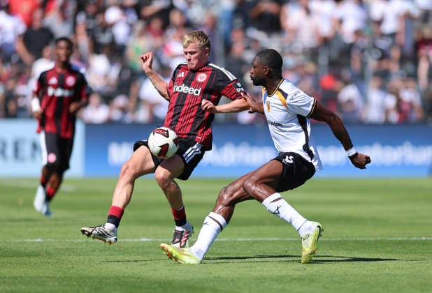 08.08.2026, Fussball Testspiel, Eintracht Frankfurt - Hull City, v.l., Jonathan Burkardt (Eintracht Frankfurt), Semi Ajayi (Hull City) DFL DFB REGULATIONS PROHIBIT ANY USE OF PHOTOGRAPHS AS IMAGE SEQUENCES AND OR QUASI-VIDEO. xdcx *** August 8, 2026, Soccer friendly match, Eintracht Frankfurt vs. Hull City, from left: Jonathan Burkardt (Eintracht Frankfurt), Semi Ajayi (Hull City). DFL and DFB regulations prohibit any use of photographs as image sequences and or quasi-video. xdcx Copyright: HMBxMedia Claus