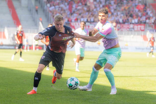 Ingolstadt, Deutschland 08. August 2026: 3. Liga - 2026 2027 - Sp. 1 - FC Ingolstadt 04 gegen FC Würzburger Kickers Im Bild: v. li. im Zweikampf Lars Lokotsch (FCI) und Ebrahim Farahnak (FWK) DFB DFL regulations prohibit any use of photographs as image sequences and or quasi-video Audi Sportpark Bayern *** Ingolstadt, Germany, August 8, 2026, 3rd League 2026–2027, Matchday 1: FC Ingolstadt 04 vs. FC Würzburger Kickers. Pictured from left, in a tackle: Lars Lokotsch (FCI) and Ebrahim Farahnak (FWK). DFB and DFL regulations prohibit any use of photographs as image sequences and or quasi-video Audi Sportpark Bayern Copyright: xFotostandx xSchäferx