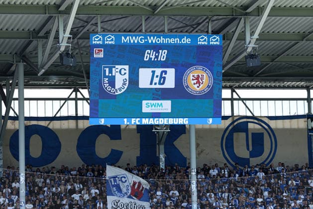 Anzeigetafel mit Spielstand 1-6 - 2. Fußball Bundesliga Saison 2026-2027 1. FC Magdeburg vs Eintracht Braunschweig in der Avnet Arena in Magdeburg - Aktion,Fußball,Mann,Männer,Deutschland,08.08.2026 *** Scoreboard showing the score 1-6-2, German Bundesliga, 2026-2027 season, 1. FC Magdeburg vs. Eintracht Braunschweig at the Avnet Arena in Magdeburg; Action, Soccer, Man, Men, Germany, August 8, 2026