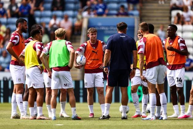 Northampton Town players receive instruction during warm up Leicester City v Northampton Town, EFL Carabao Cup, First Round, Football, King Power Stadium, Leicester, UK - 08 Aug 2026Leicester King Power Stadium United Kingdom EDITORIAL USE ONLY No use with unauthorised audio, video, data, fixture lists, club league logos or live services. Online in-match use limited to 120 images, no video emulation. No use in betting, games or single club league player publications.  Copyright: xMarkxKerton Shutterstockx 17051082am