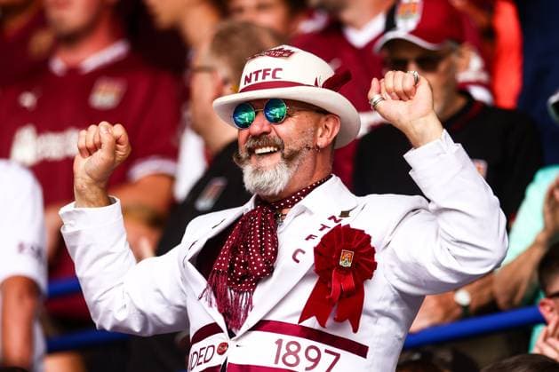 Northampton Town fans sing Leicester City v Northampton Town, EFL Carabao Cup, First Round, Football, King Power Stadium, Leicester, UK - 08 Aug 2026Leicester King Power Stadium United Kingdom EDITORIAL USE ONLY No use with unauthorised audio, video, data, fixture lists, club league logos or live services. Online in-match use limited to 120 images, no video emulation. No use in betting, games or single club league player publications.  Copyright: xMarkxKerton Shutterstockx 17051082au