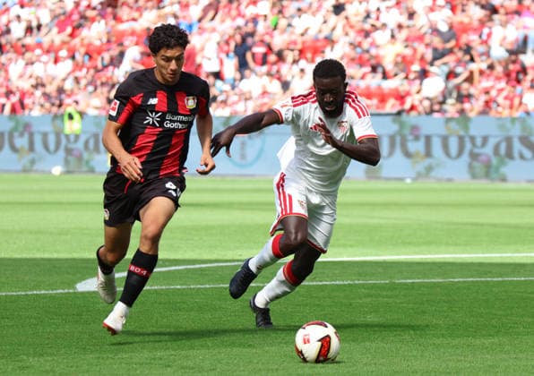 v.l. Ibrahim Maza (Bayer Leverkusen, 30), Arouna Sangante (Sevilla FC, 12) GER, Bayer 04 Leverkusen vs. Sevilla FC, 1. Bundesliga , Saisoneroeffnungsspiel, Spielzeit 2026 2027, 08.08.2026 (DFL DFB REGULATIONS PROHIBIT ANY USE OF PHOTOGRAPHS as IMAGE SEQUENCES and or QUASI-VIDEO). GER, Bayer 04 Leverkusen vs. Sevilla FC, 1. Bundesliga , Saisoneroeffnungsspiel, Spielzeit 2026 2027, 08.08.2026 Leverkusen *** from left: Ibrahim Maza, Bayer Leverkusen, 30; Arouna Sangante, Sevilla FC, 12 (GER); Bayer 04 Leverkusen vs. Sevilla FC, Bundesliga 1, season opener, 2026–2027 season, August 8, 2026 DFL and DFB regulations prohibit any use of photographs as image sequences and or quasi-video GER, Bayer 04 Leverkusen vs. Sevilla FC, Bundesliga 1, season opener, 2026–2027 season, August 8, 2026, Leverkusen Copyright: xEibner-Pressefotox EP_TSR