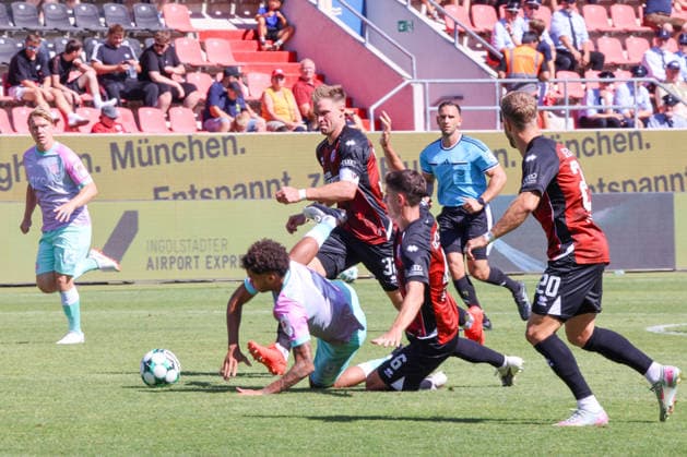 Ohne Not bringen Simon Lorenz (FC Ingolstadt 04, Nr.32) und Georgios Antzoulas (FC Ingolstadt 04, Nr.6) Namrud Embaye (Wuerzburger Kickers, Nr.6) zu Fall beim Spiel FC Ingolstadt 04 gegen Wuerzburger Kickers am 08.08.2026, DFB regulations prohibit any use of photographs as image sequences and or quasi-video. GER, Fussball, 3. Liga, Spieltag 1, FC Ingolstadt 04 gegen Wuerzburger Kickers, 08.08.2026, Audi Sportpark Ingolstadt *** In a non-critical situation, Simon Lorenz of FC Ingolstadt 04, No. 32, and Georgios Antzoulas of FC Ingolstadt 04, No. 6, Namrud Embaye of Würzburger Kickers, No. 6, during the match between FC Ingolstadt 04 and Würzburger Kickers on August 8, 2026, DFB regulations prohibit any use of photographs as image sequences and or quasi-video. GER, Soccer, 3. Liga, Matchday 1, FC Ingolstadt 04 vs. Würzburger Kickers, August 8, 2026, Audi Sportpark Ingolstadt Copyright: xEibner-Pressefoto OliverxSTRISCHx EP-OSH