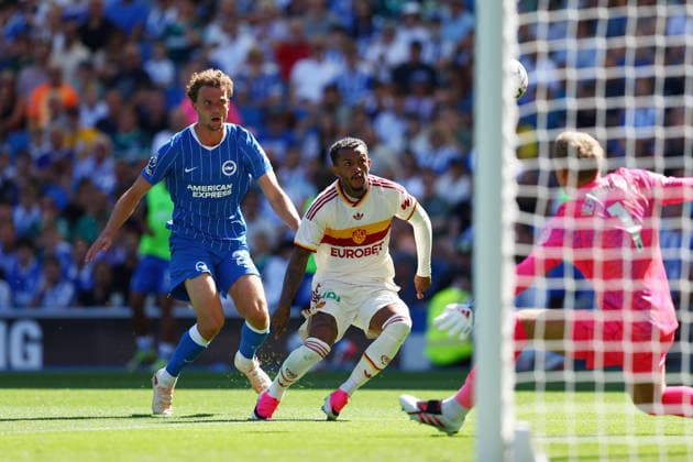 Brighton and Hove, England, 8th August 2026. Wesley of AS Roma has a shot under pressure from Mats Wieffer of Brighton & Hove Albion during the Brighton and Hove Albion vs AS Roma Pre Season Friendly match at the AMEX Stadium, Brighton and Hove. Picture credit should read: Andrew Yates Sportimage EDITORIAL USE ONLY. No use with unauthorised audio, video, data, fixture lists, club league logos or live services. Online in-match use limited to 120 images, no video emulation. No use in betting, games or single club league player publications. SPI_001_PT_Brighton_Roma SPI-4897-0001