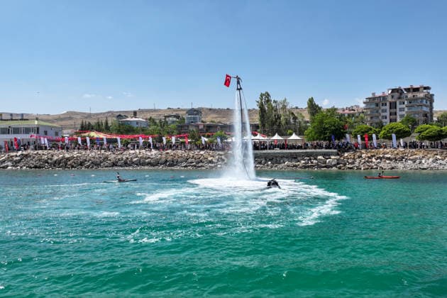12th Van Sea Water Sports Festival kicks off on Lake Van VAN, TURKIYE - AUGUST 08: A view of participants and athletes taking part in the 12th Van Sea Water Sports Festival held at the Edremit-Gebze Water Sports Center on the shores of Lake Van in Van, Turkiye, on August 08, 2026. Organized to promote Lake Van and boost local tourism, the two-day event features Beach volleyball, Beachvolleyball and handball matches, flyboard demonstrations, canoeing, rowing, dragon boat races, and various recreational activities. Ozkan Bilgin Anadolu Van Turkey. Editorial use only. Please get in touch for any other usage.  Copyright: x2026xAnadoluxOzkanxBilginx