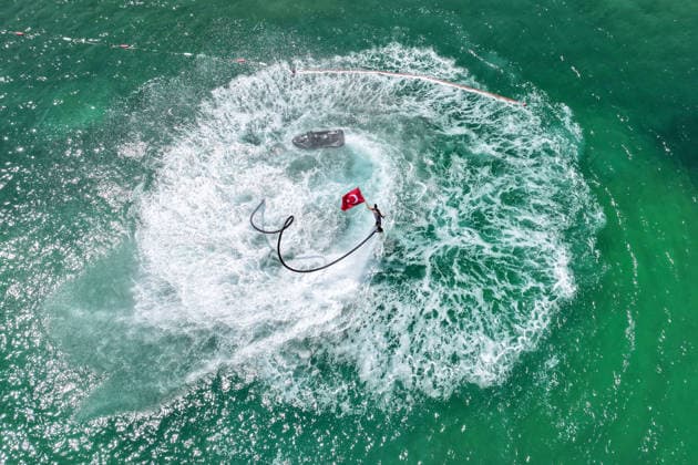 12th Van Sea Water Sports Festival kicks off on Lake Van VAN, TURKIYE - AUGUST 08: A view of participants and athletes taking part in the 12th Van Sea Water Sports Festival held at the Edremit-Gebze Water Sports Center on the shores of Lake Van in Van, Turkiye, on August 08, 2026. Organized to promote Lake Van and boost local tourism, the two-day event features Beach volleyball, Beachvolleyball and handball matches, flyboard demonstrations, canoeing, rowing, dragon boat races, and various recreational activities. Ozkan Bilgin Anadolu Van Turkey. Editorial use only. Please get in touch for any other usage.  Copyright: x2026xAnadoluxOzkanxBilginx