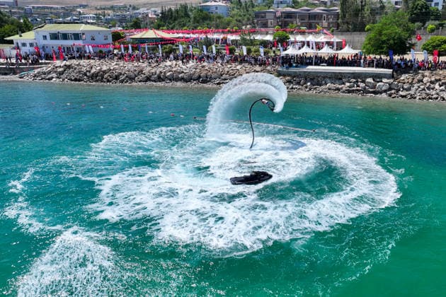 12th Van Sea Water Sports Festival kicks off on Lake Van VAN, TURKIYE - AUGUST 08: A view of participants and athletes taking part in the 12th Van Sea Water Sports Festival held at the Edremit-Gebze Water Sports Center on the shores of Lake Van in Van, Turkiye, on August 08, 2026. Organized to promote Lake Van and boost local tourism, the two-day event features Beach volleyball, Beachvolleyball and handball matches, flyboard demonstrations, canoeing, rowing, dragon boat races, and various recreational activities. Ozkan Bilgin Anadolu Van Turkey. Editorial use only. Please get in touch for any other usage.  Copyright: x2026xAnadoluxOzkanxBilginx